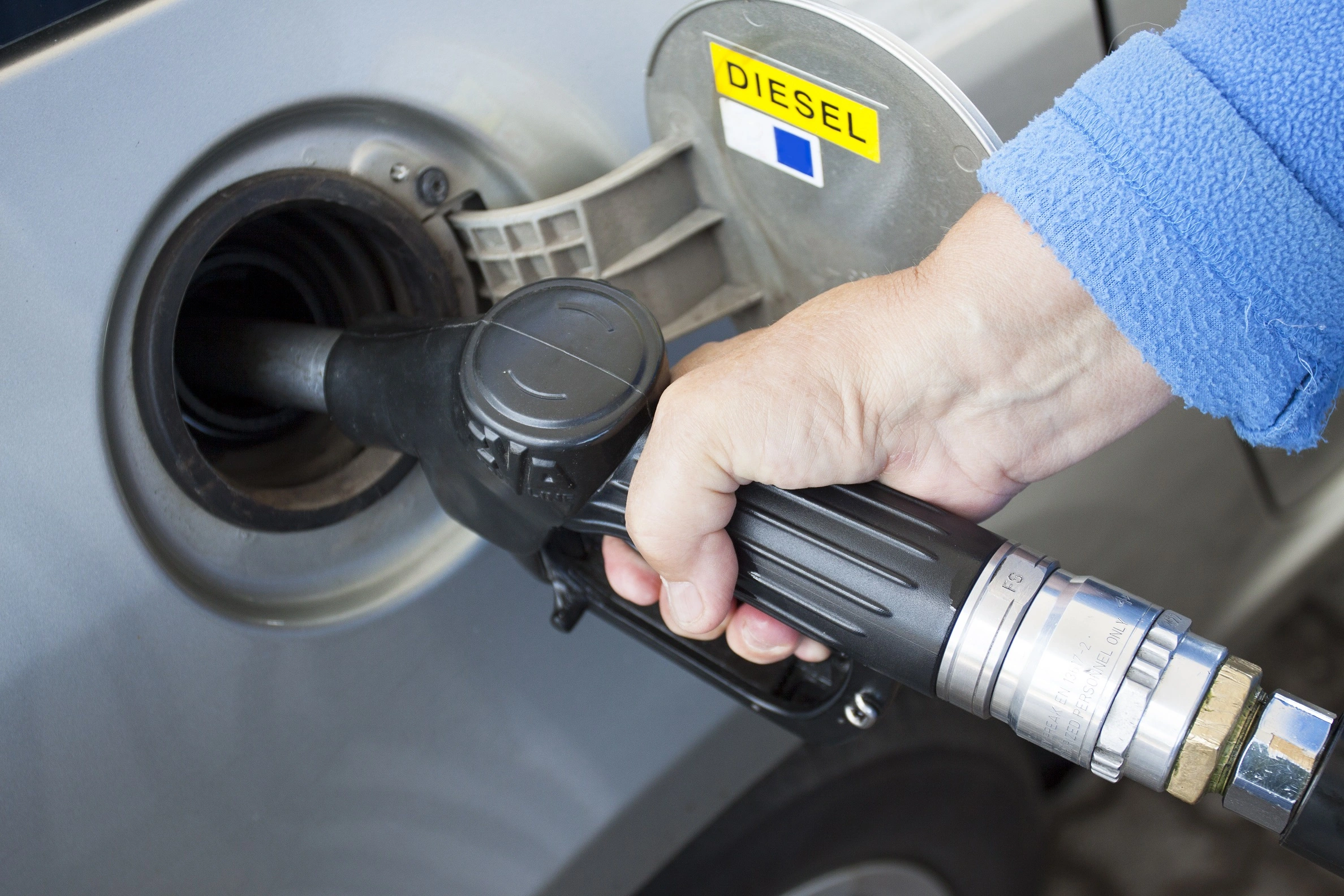 Pouring Diesel in Car’s Diesel Tank